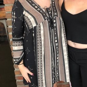 Long sleeve black and tan pattern dress